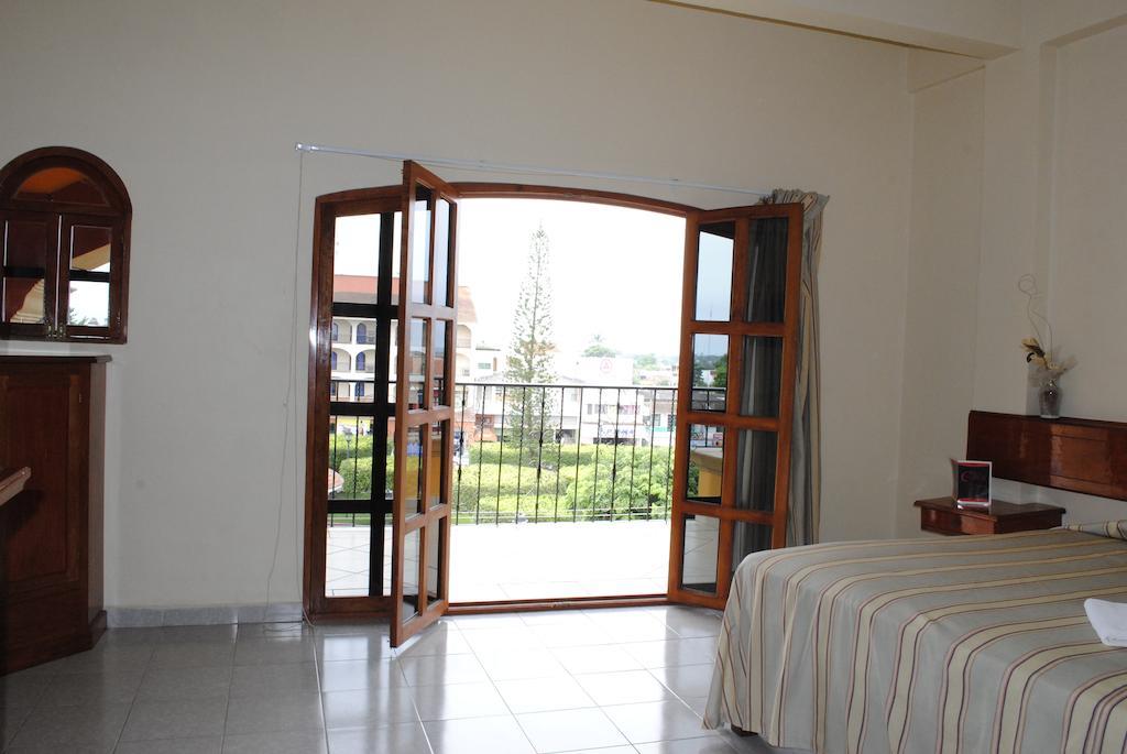 Hotel Arcos Del Parque Acayucan Quarto foto