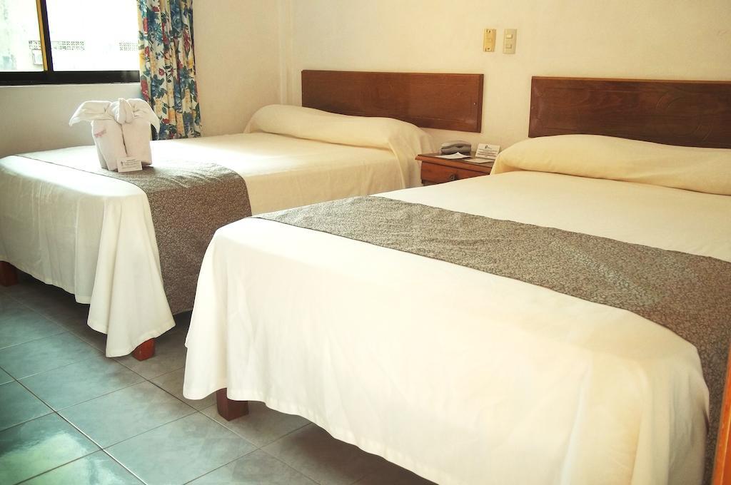 Hotel Arcos Del Parque Acayucan Quarto foto